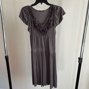 Soprano fun brown mini dress with ruffled cap sleeve.